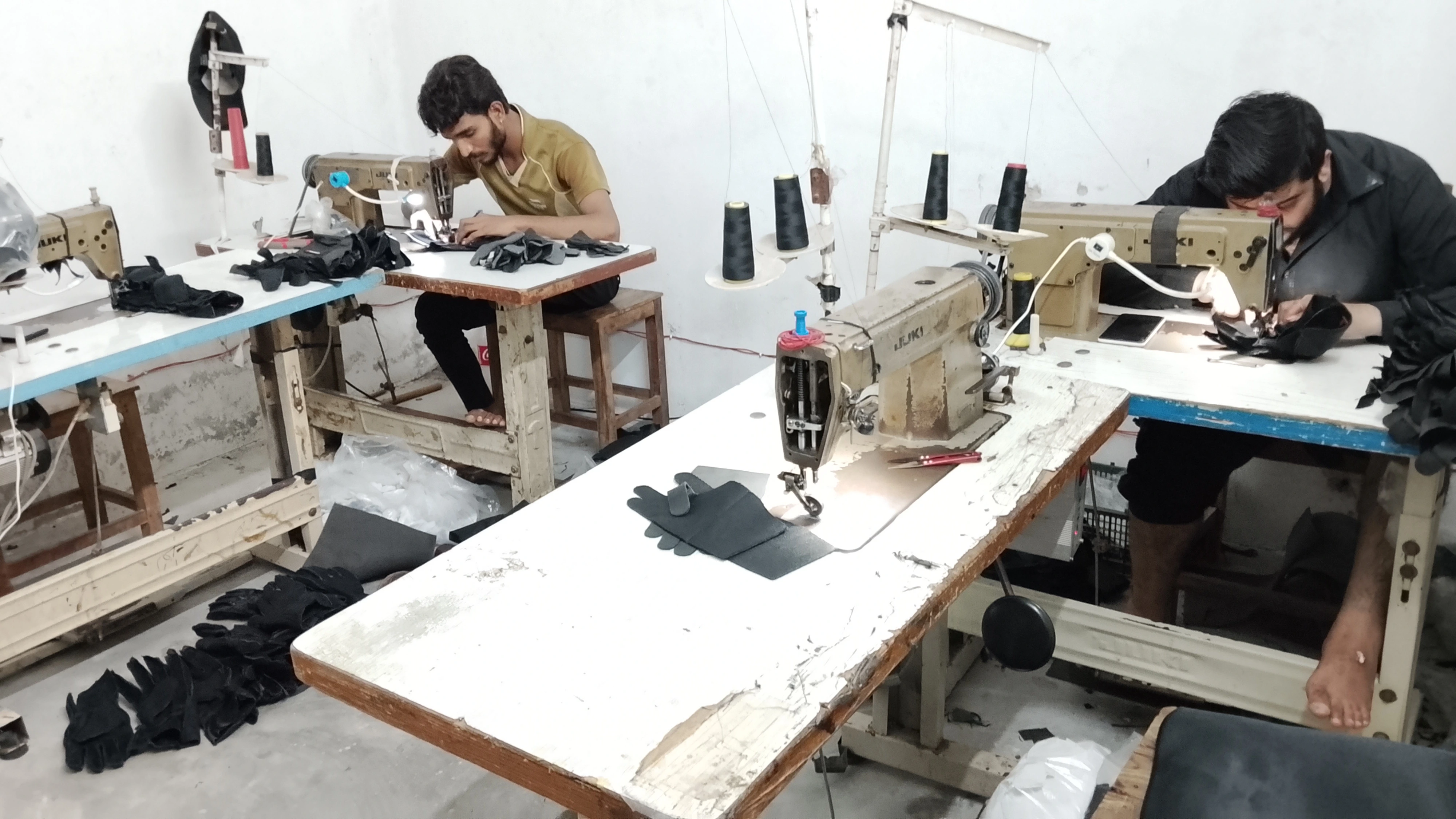 Machinists working on Juki sewing machines